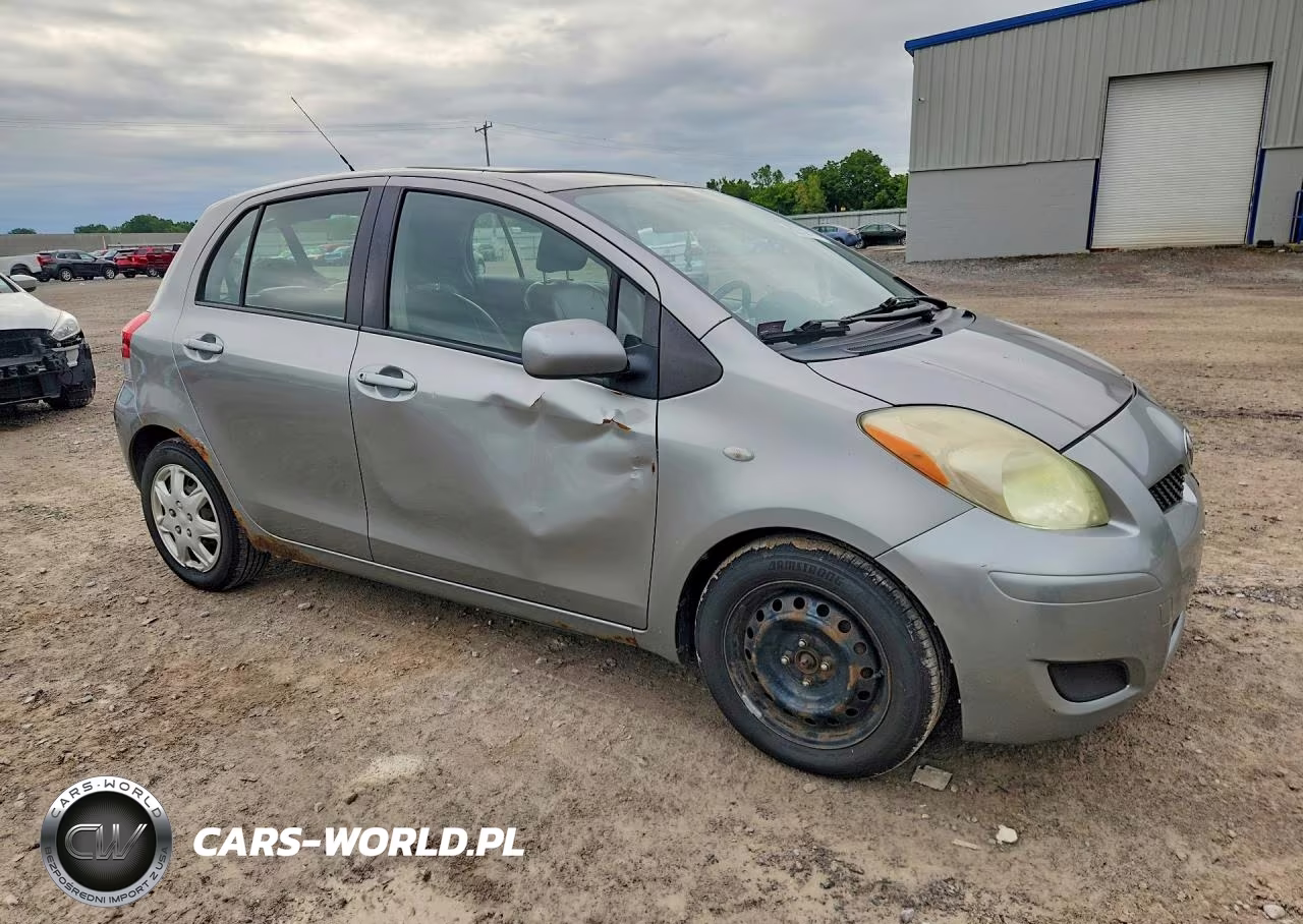 2009 Toyota Yaris Base VIN:JTDKT903795232612 - 4