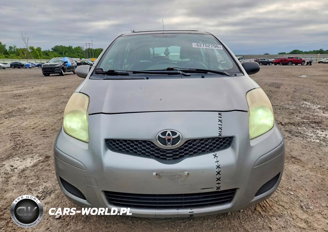 2009 Toyota Yaris Base VIN:JTDKT903795232612 - 5