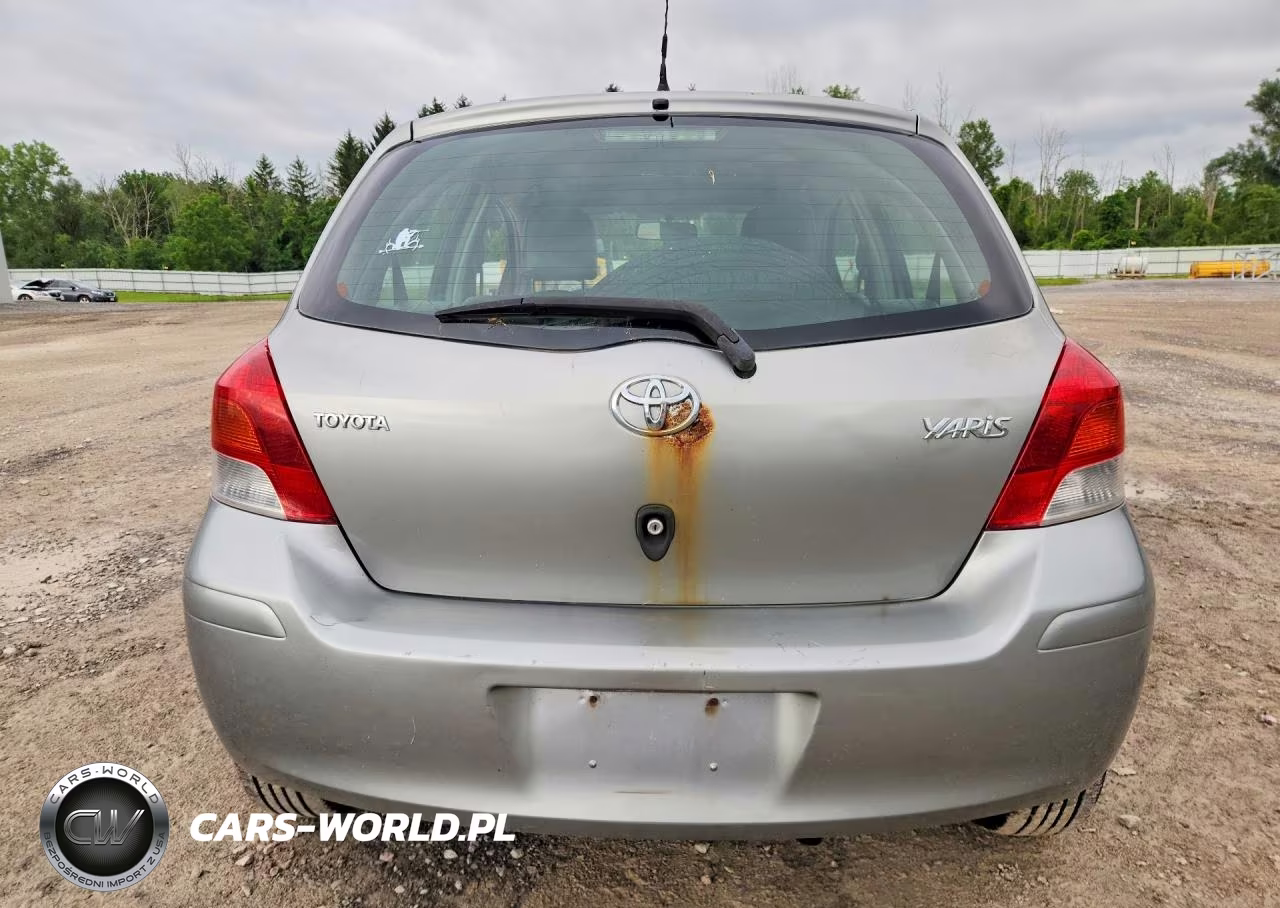 2009 Toyota Yaris Base VIN:JTDKT903795232612 - 6