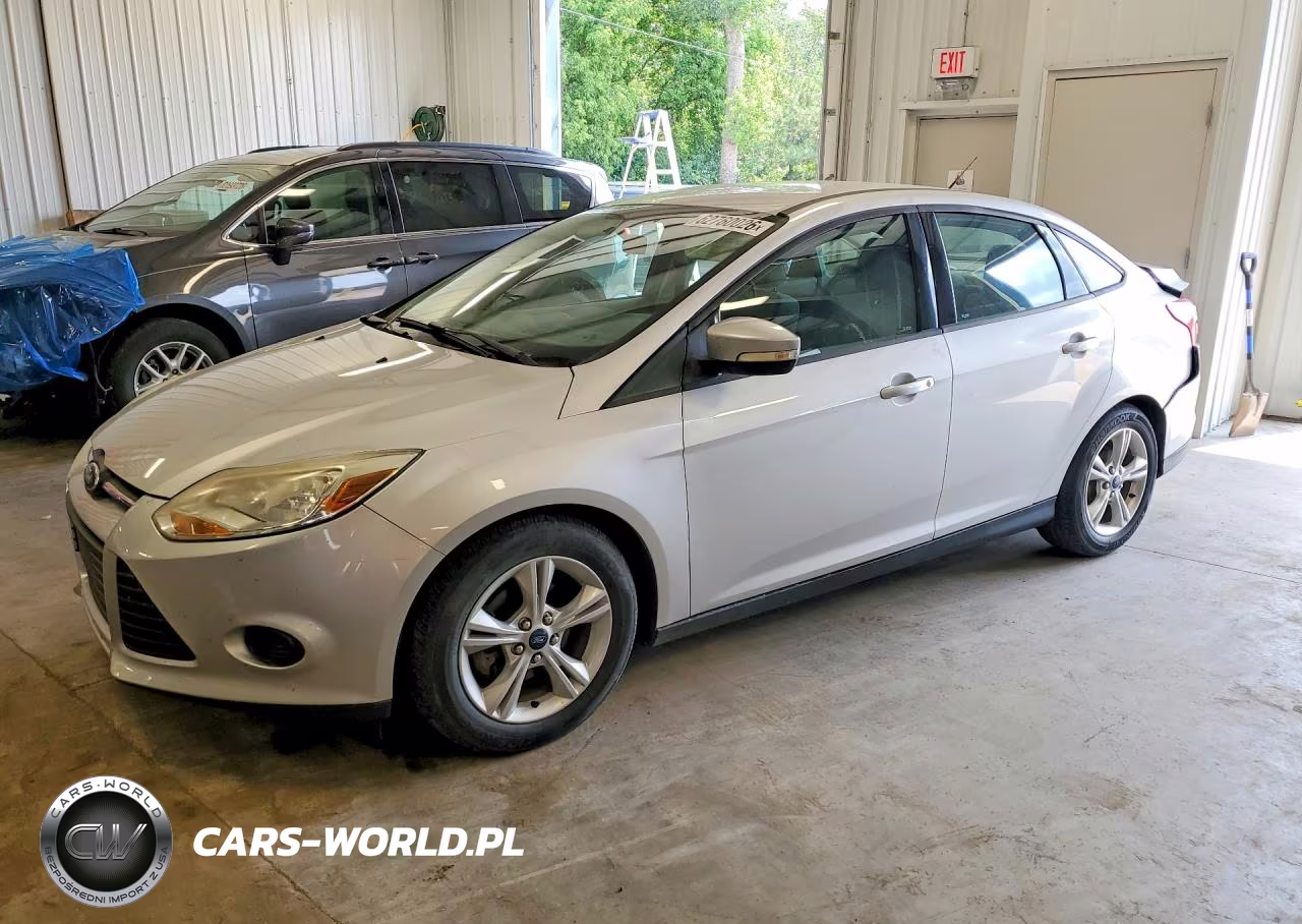 2014 Ford Focus Se VIN:1FADP3F28EL394110 - 1