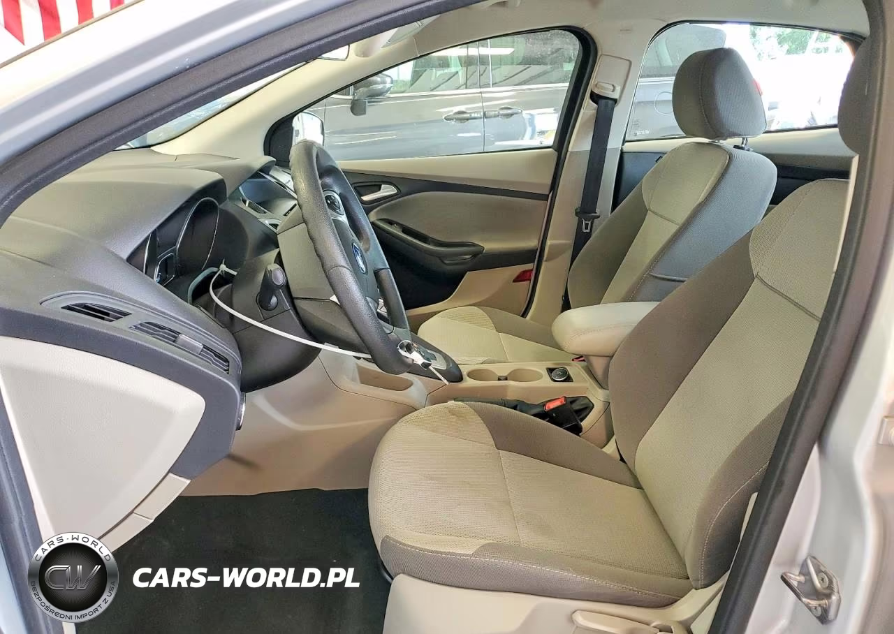 2014 Ford Focus Se VIN:1FADP3F28EL394110 - 7