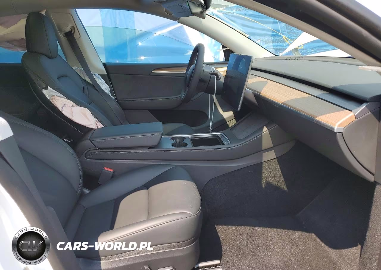 2023 Tesla Model Y VIN:7SAYGDEE9PA119297 - 7