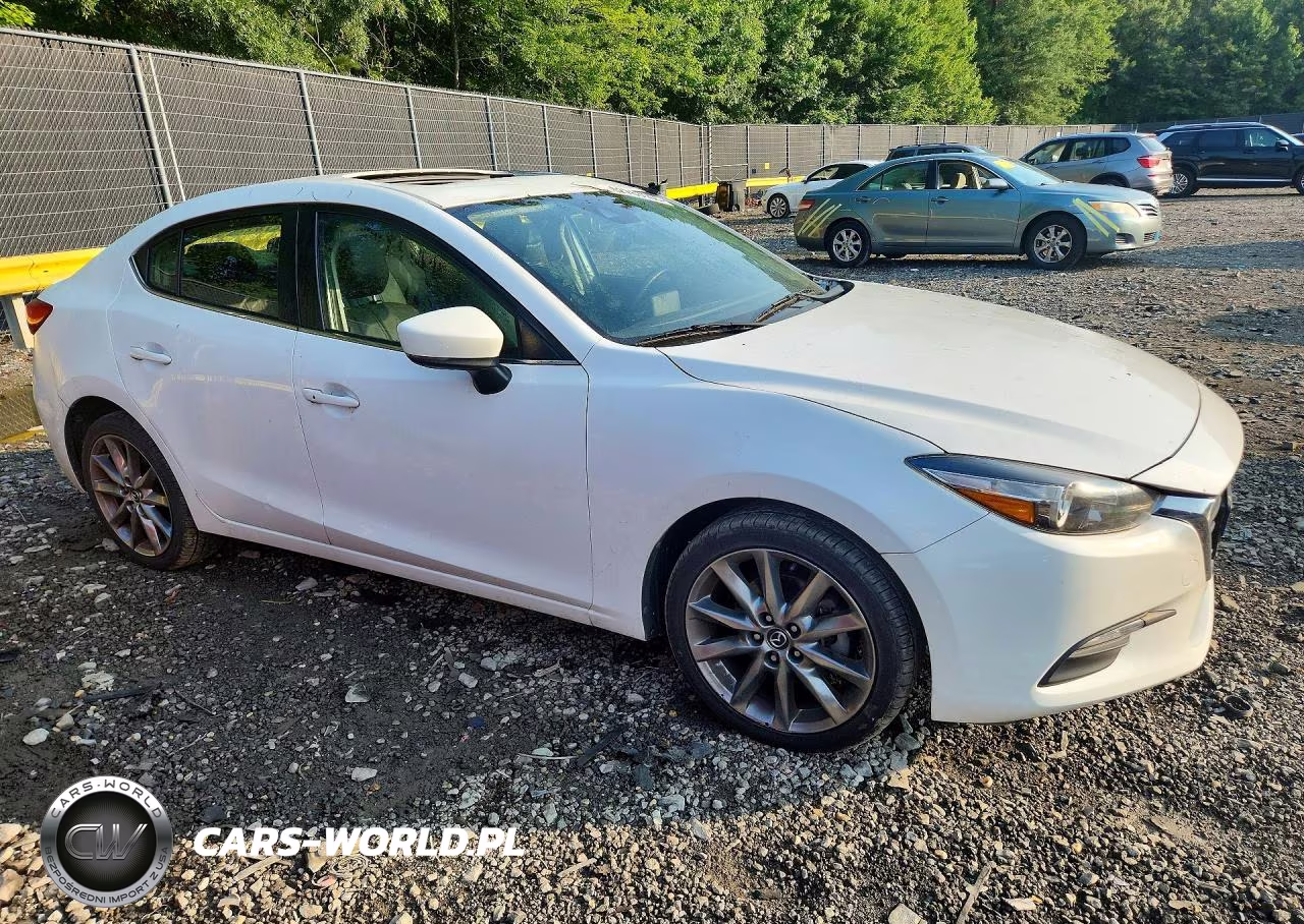 2018 Mazda 3 Touring VIN:3MZBN1V39JM264798 - 4