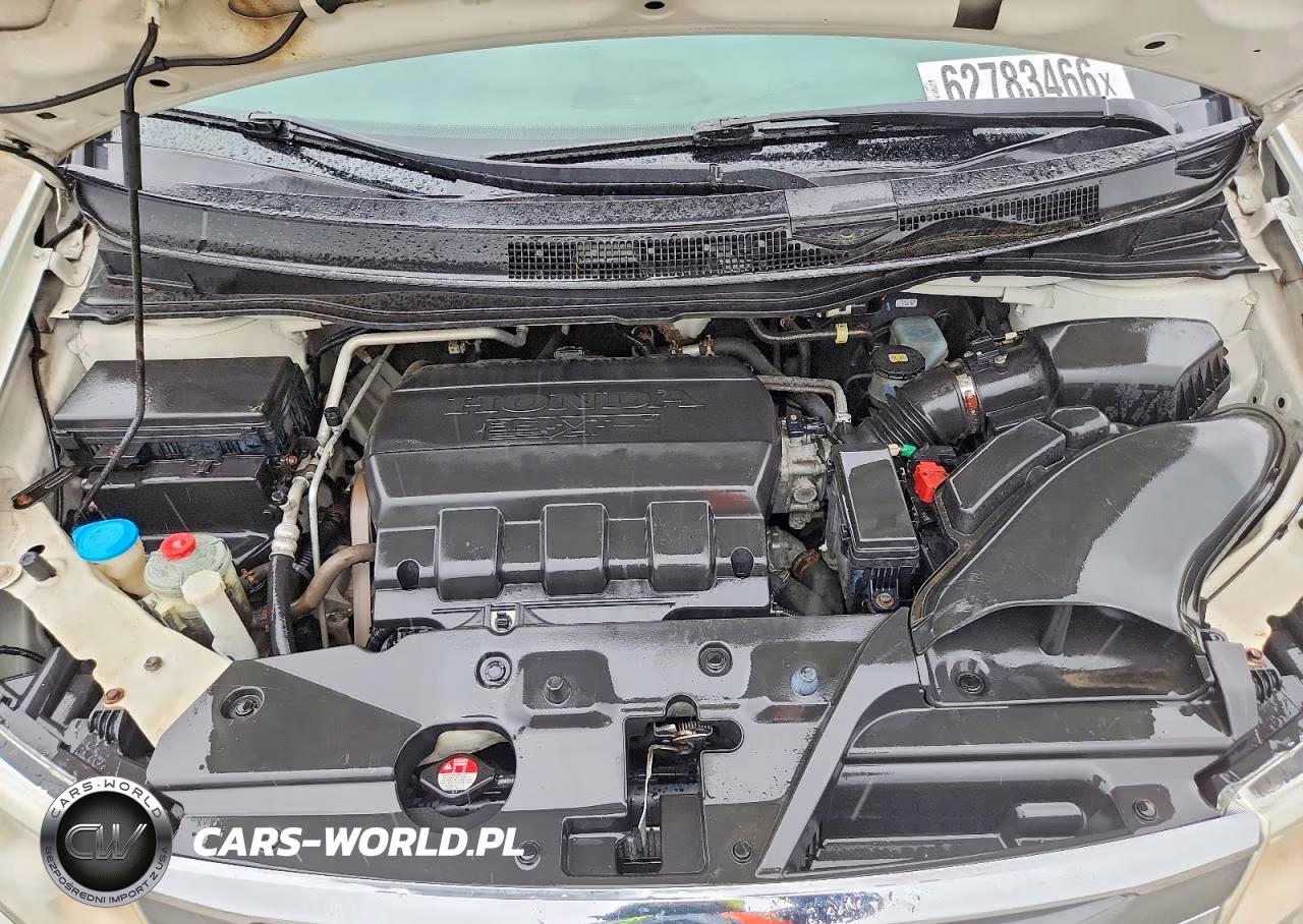 2012 Honda Odyssey Touring VIN:5FNRL5H98CB118897 - 12