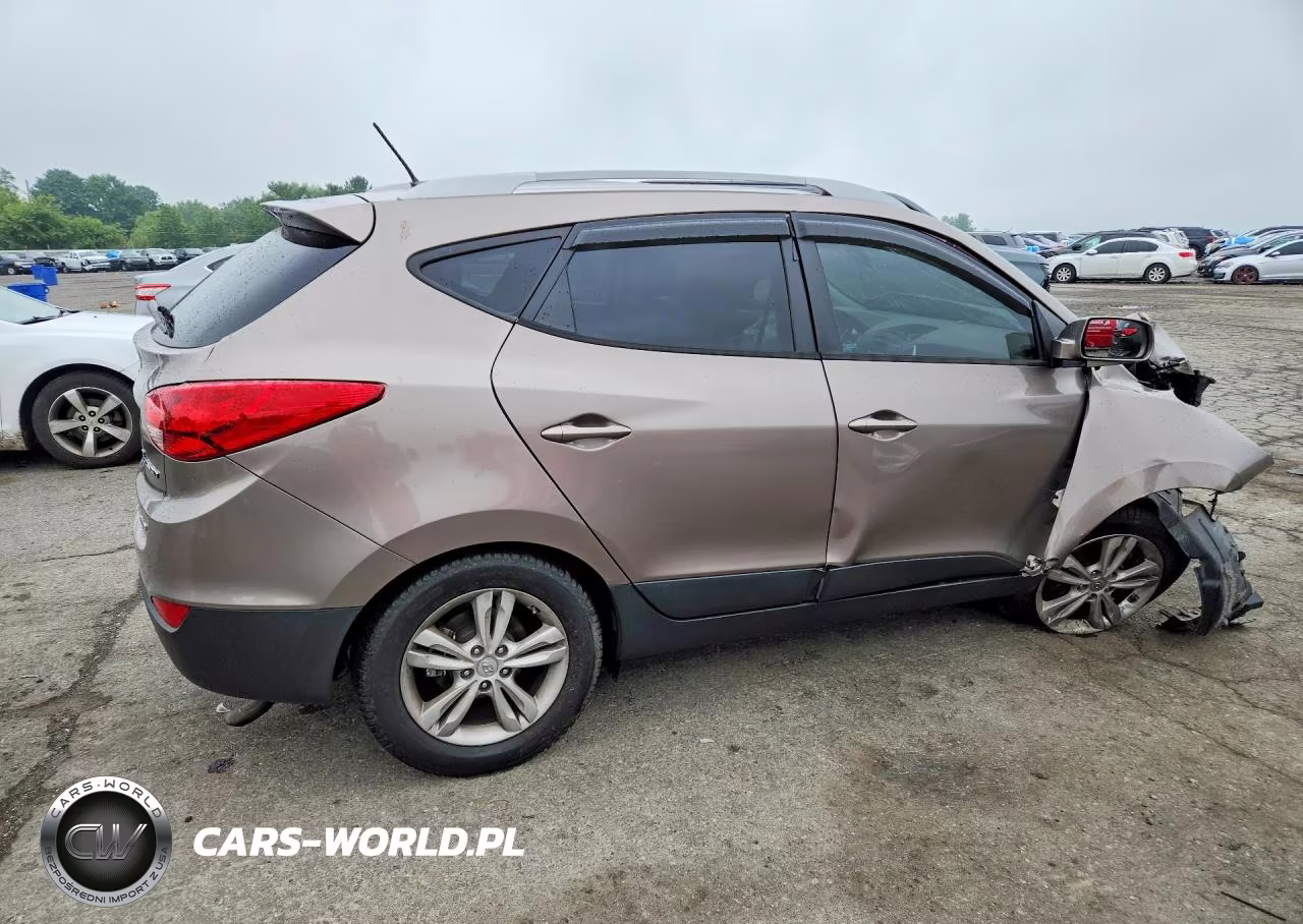 2011 Hyundai Tucson VIN:KM8JUCAC9BU205827 - 3