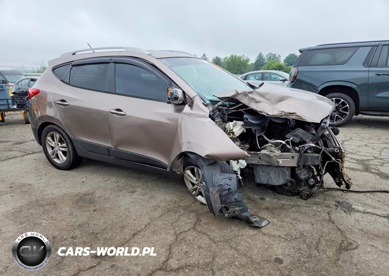 2011 Hyundai Tucson VIN:KM8JUCAC9BU205827 - 4