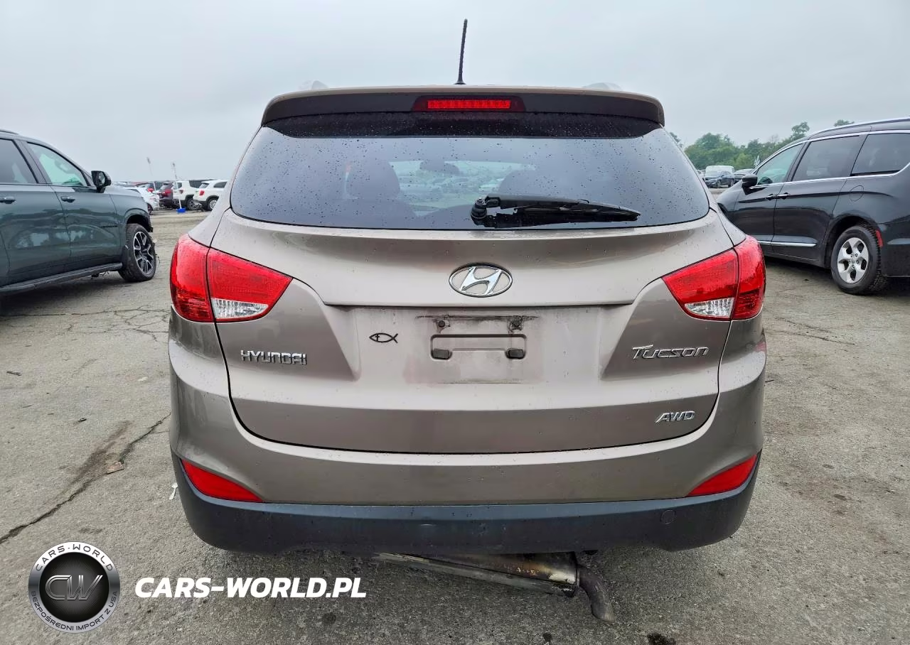 2011 Hyundai Tucson VIN:KM8JUCAC9BU205827 - 6