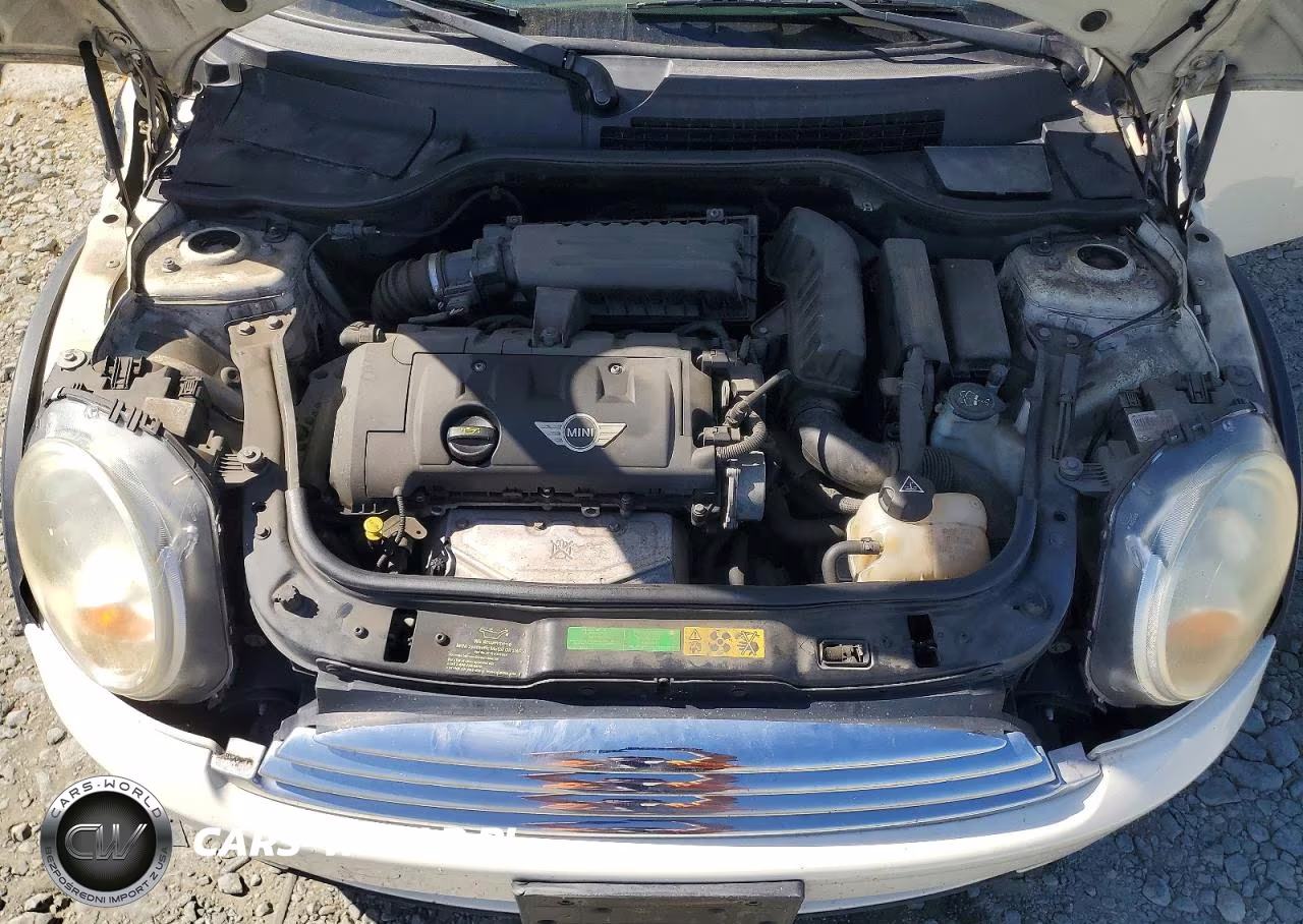 2009 Mini Cooper VIN:WMWMF335X9TU75740 - 11
