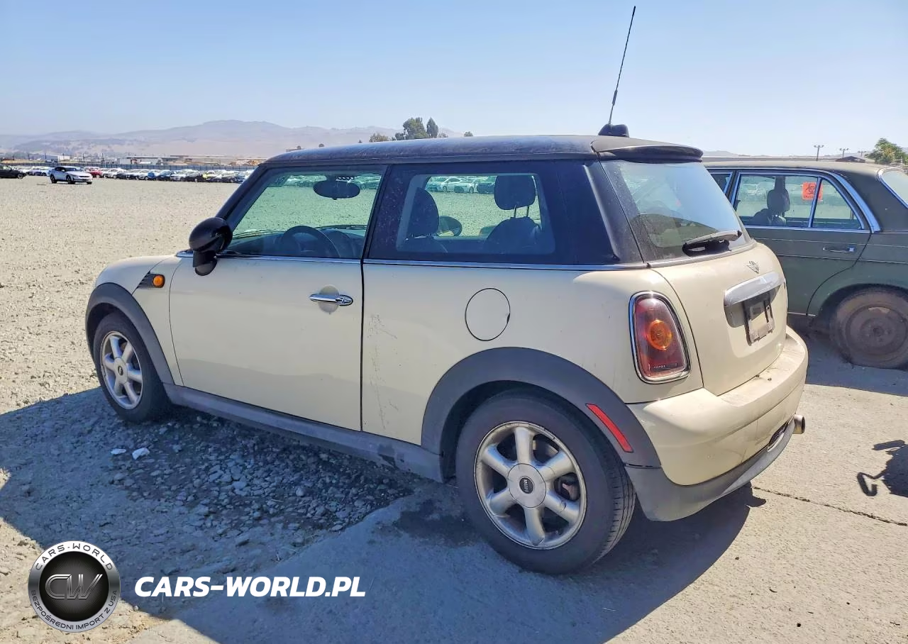 2009 Mini Cooper VIN:WMWMF335X9TU75740 - 2