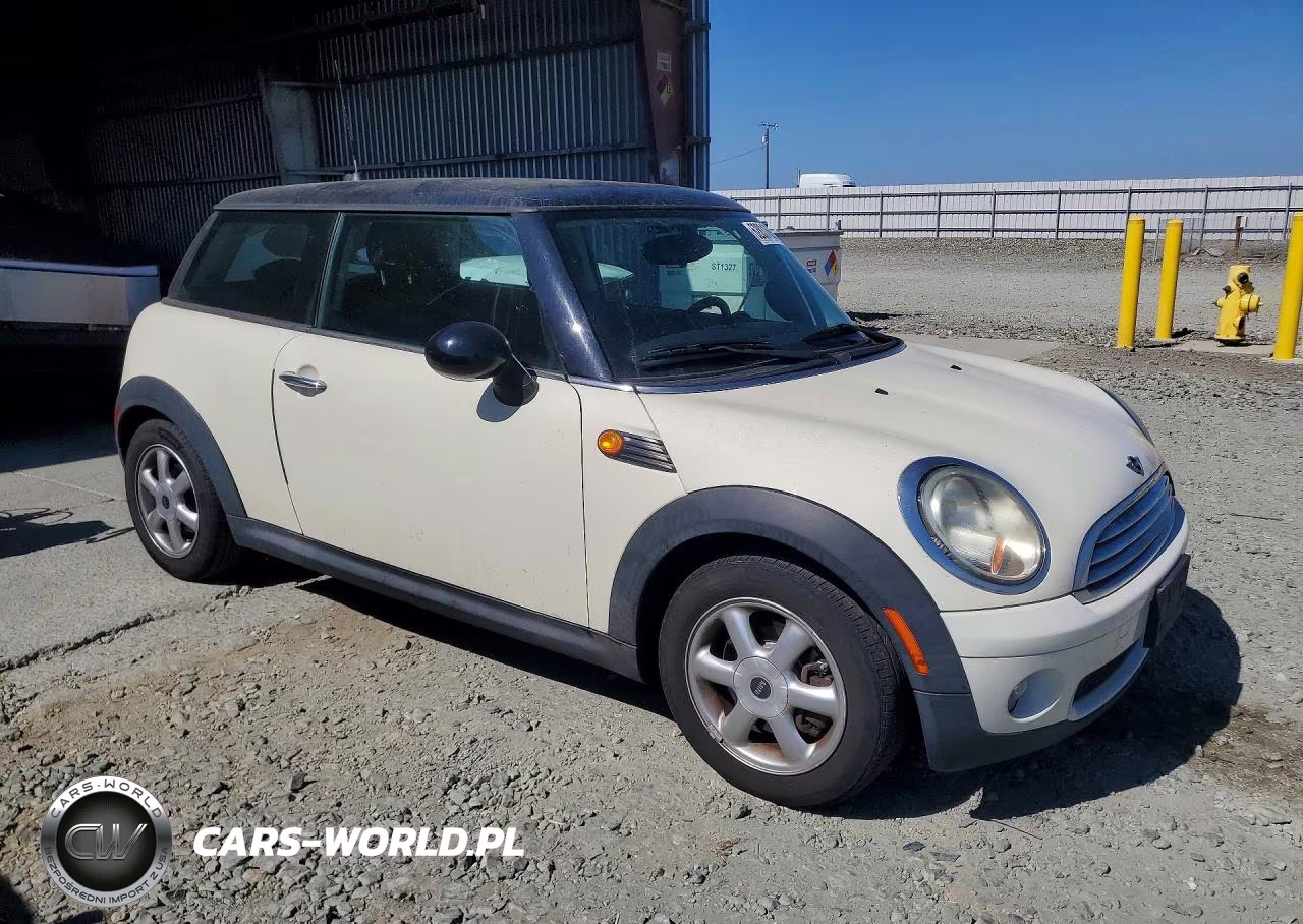 2009 Mini Cooper VIN:WMWMF335X9TU75740 - 4