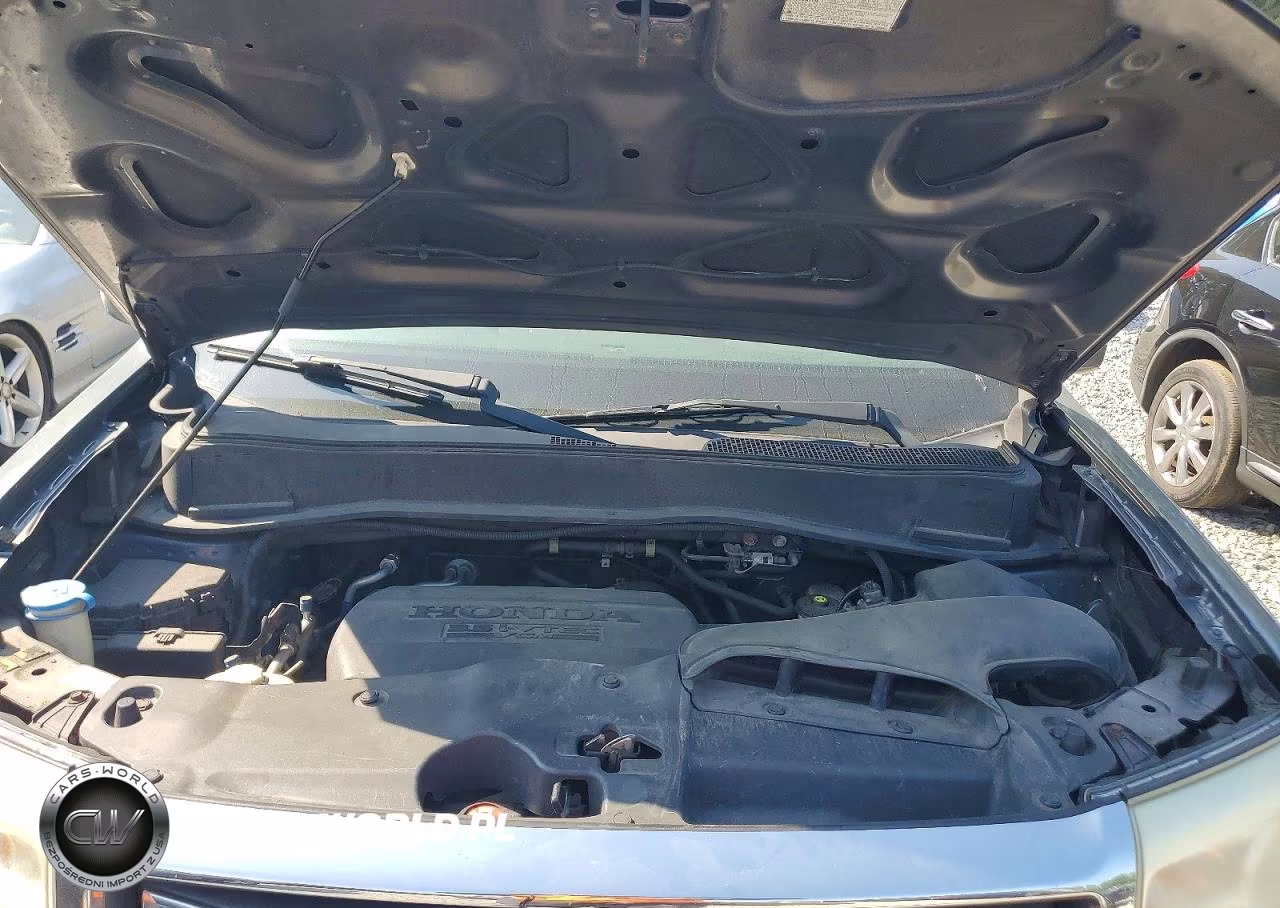 2012 Honda Pilot Exln VIN:5FNYF4H75CB008384 - 12