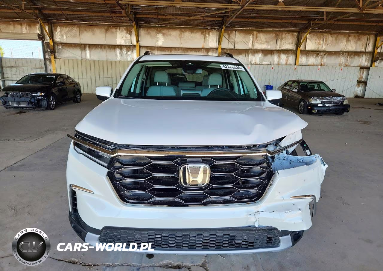 2025 Honda Pilot Touring VIN:5FNYG1H79SB167077 - 5
