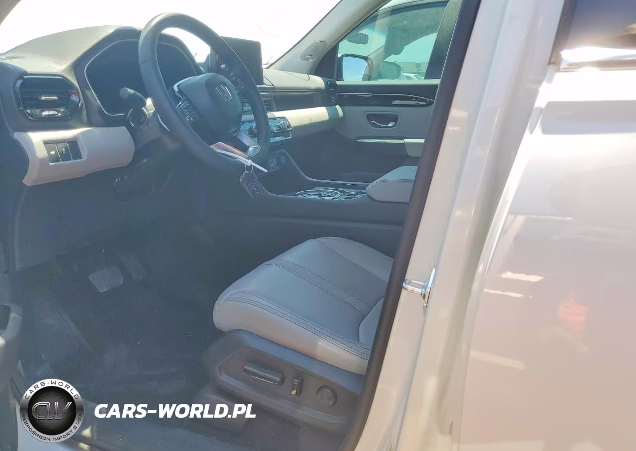 2025 Honda Pilot Touring VIN:5FNYG1H79SB167077 - 7
