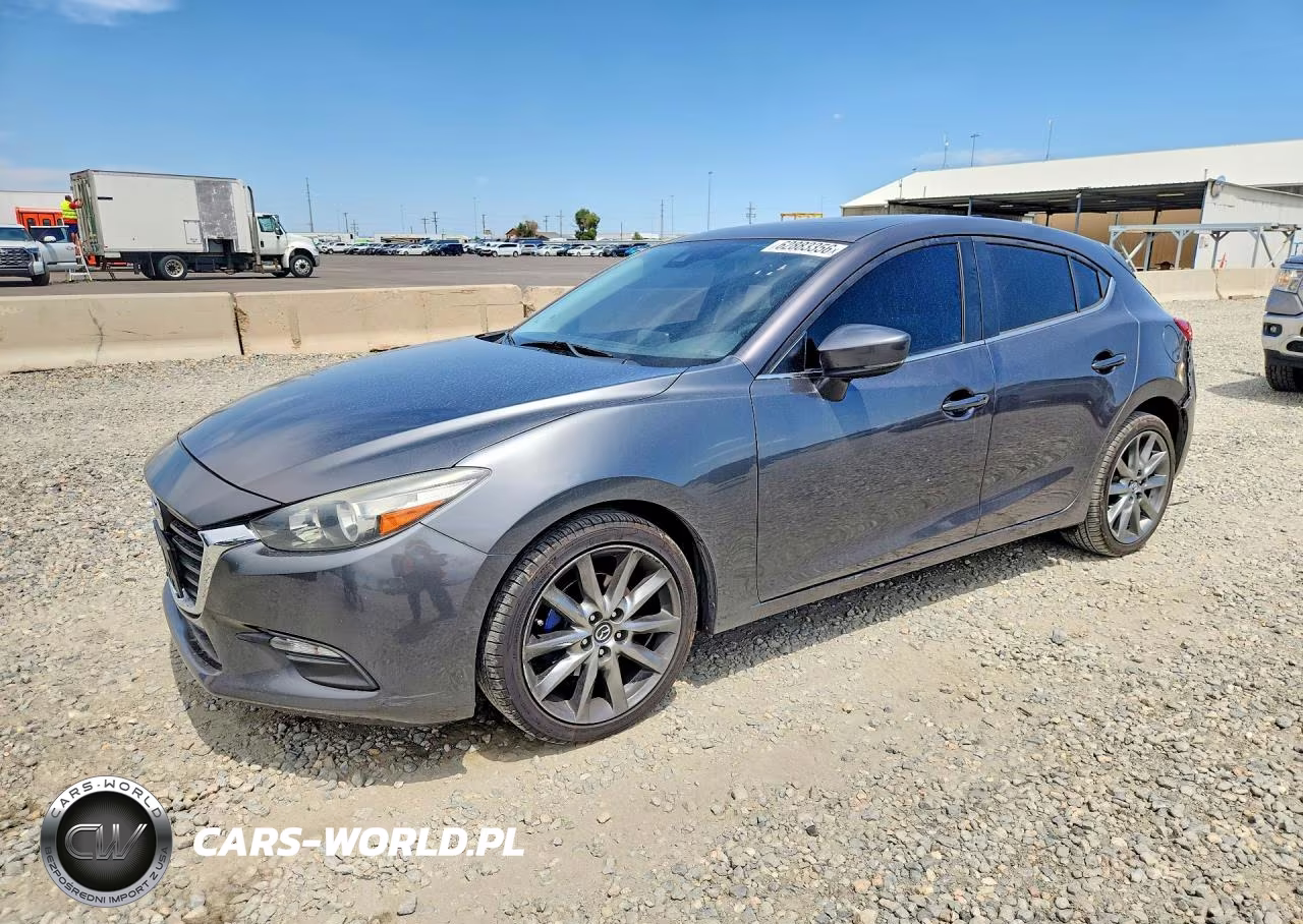 2018 Mazda 3 Touring VIN:3MZBN1L31JM252146 - 1