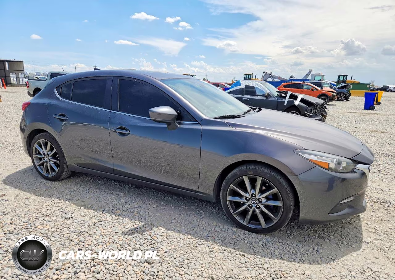 2018 Mazda 3 Touring VIN:3MZBN1L31JM252146 - 4