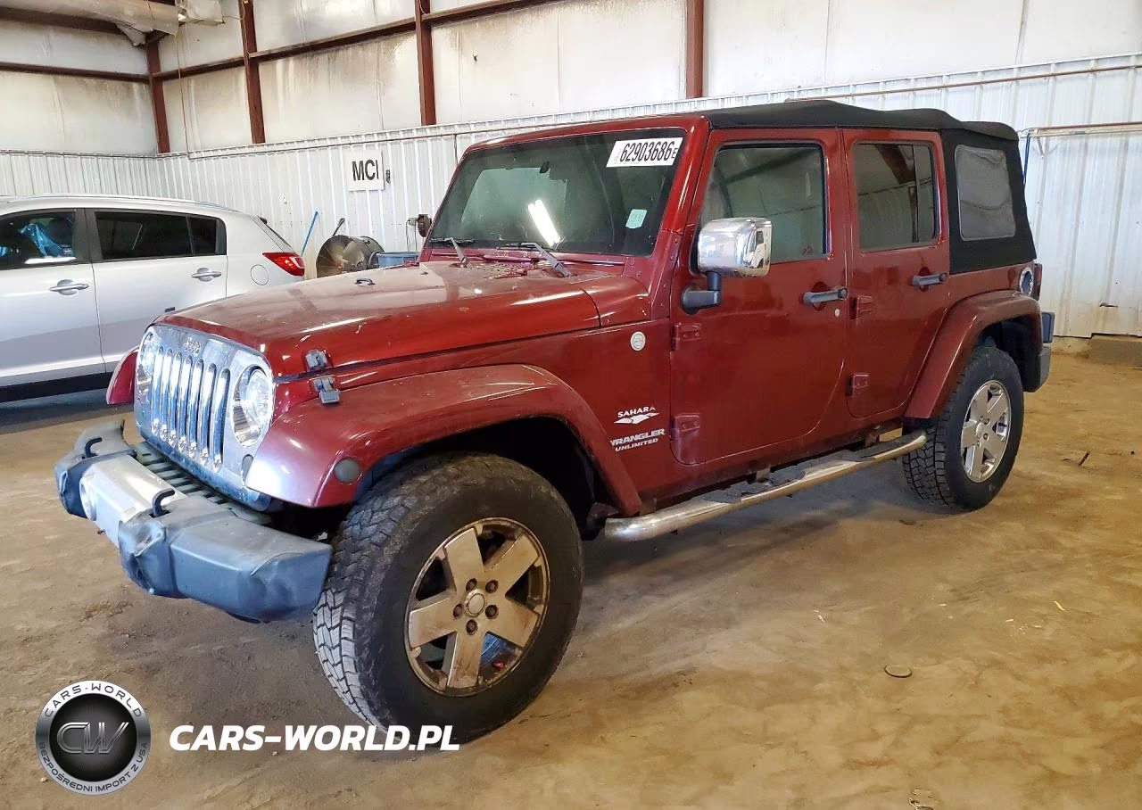 2010 Jeep Wrangler Unlimited Sahara VIN:1J4BA5H12AL114415 - 1