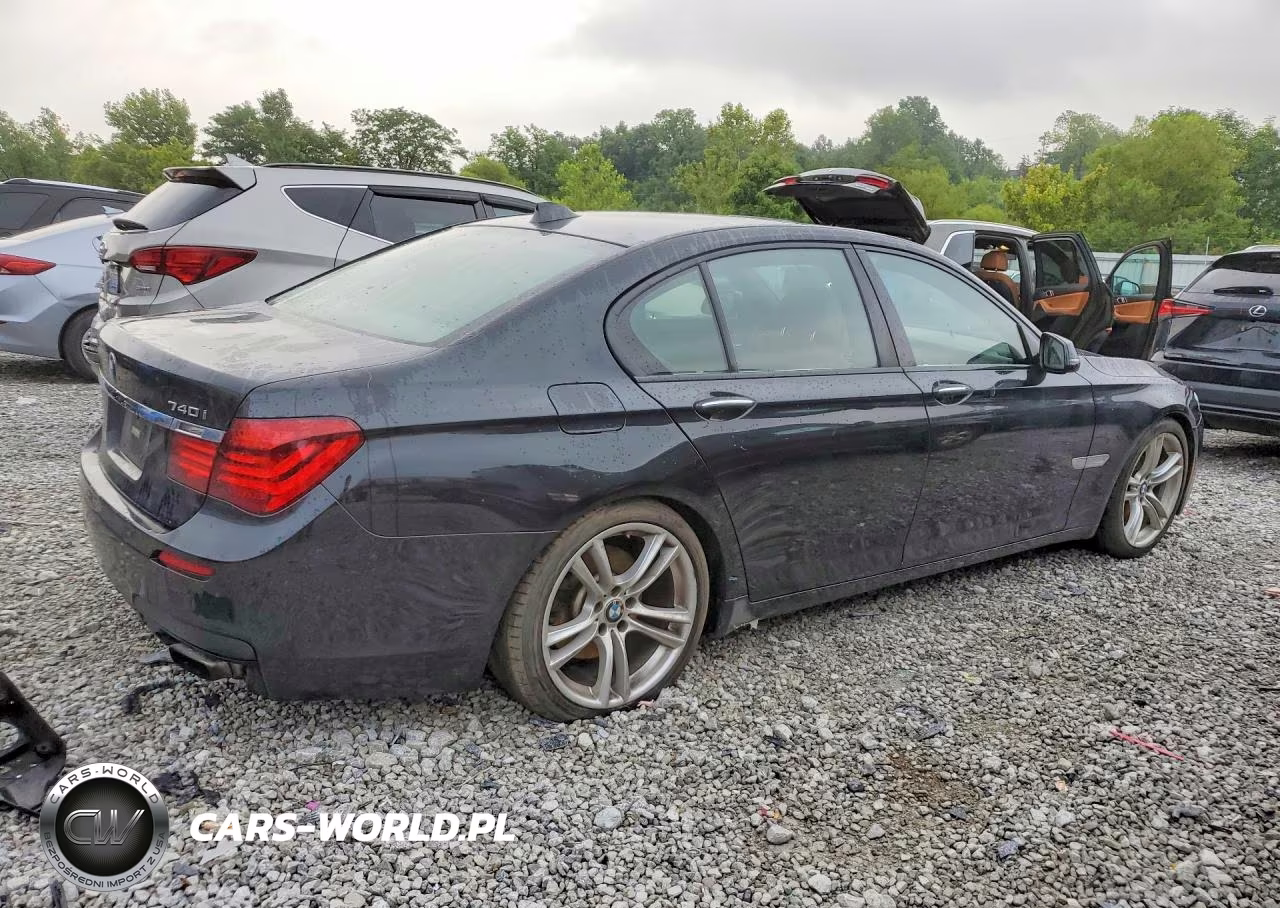 2015 BMW 740 I VIN:WBAYA6C50FGK16292 - 3