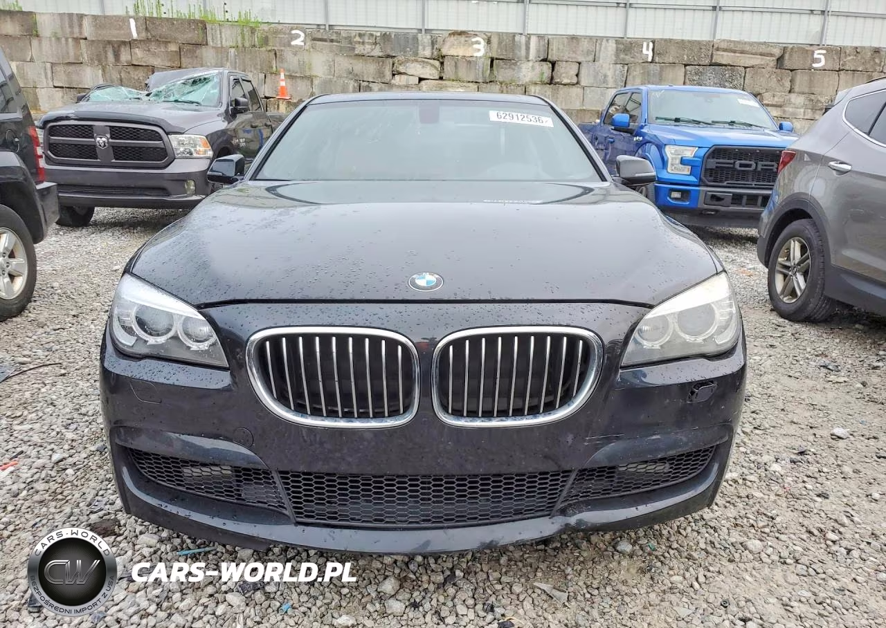 2015 BMW 740 I VIN:WBAYA6C50FGK16292 - 5