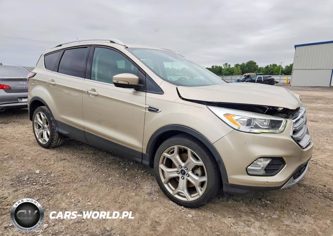 2017 Ford Escape Titanium VIN:1FMCU0J90HUB86055 - 4