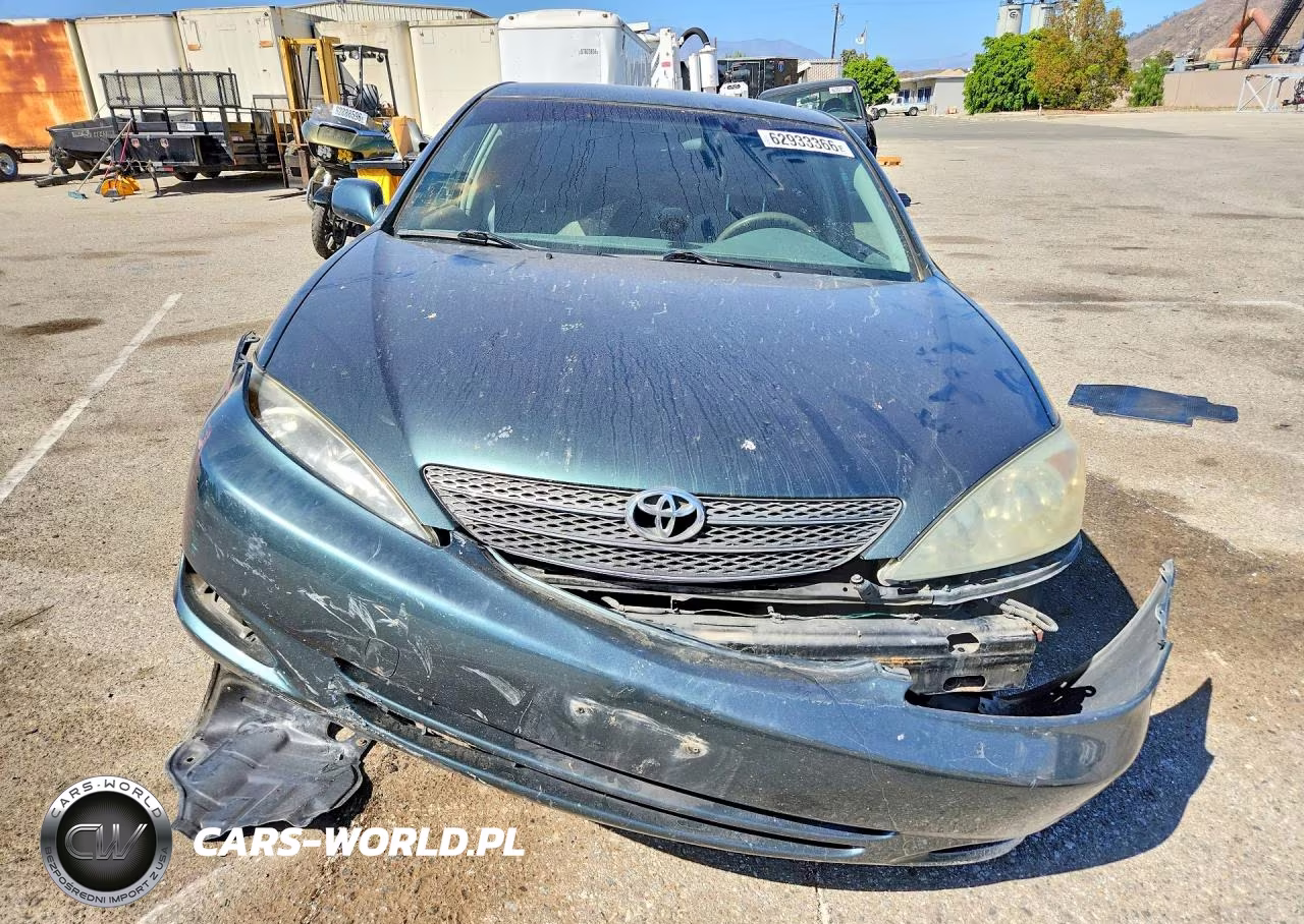 2002 Toyota Camry Le VIN:JTDBE32K720136672 - 5