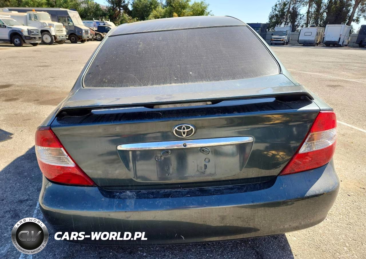 2002 Toyota Camry Le VIN:JTDBE32K720136672 - 6