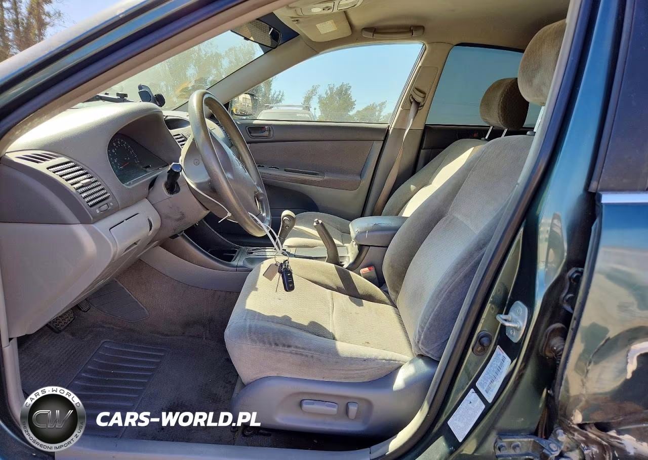 2002 Toyota Camry Le VIN:JTDBE32K720136672 - 7