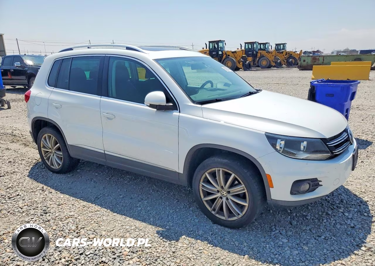 2015 Volkswagen Tiguan S VIN:WVGBV7AX5FW520078 - 4