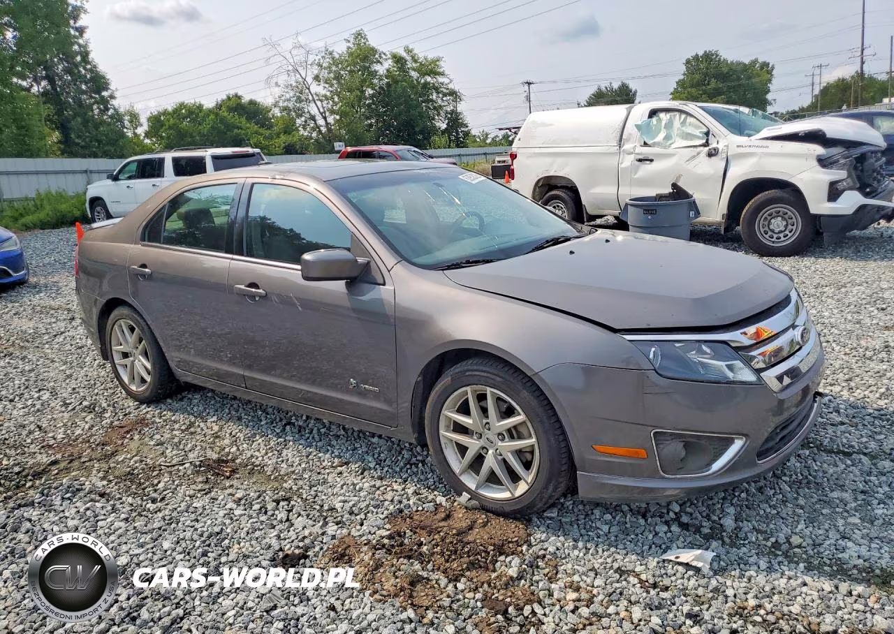 2010 Ford Fusion Hybrid VIN:3FADP0L37AR426990 - 4