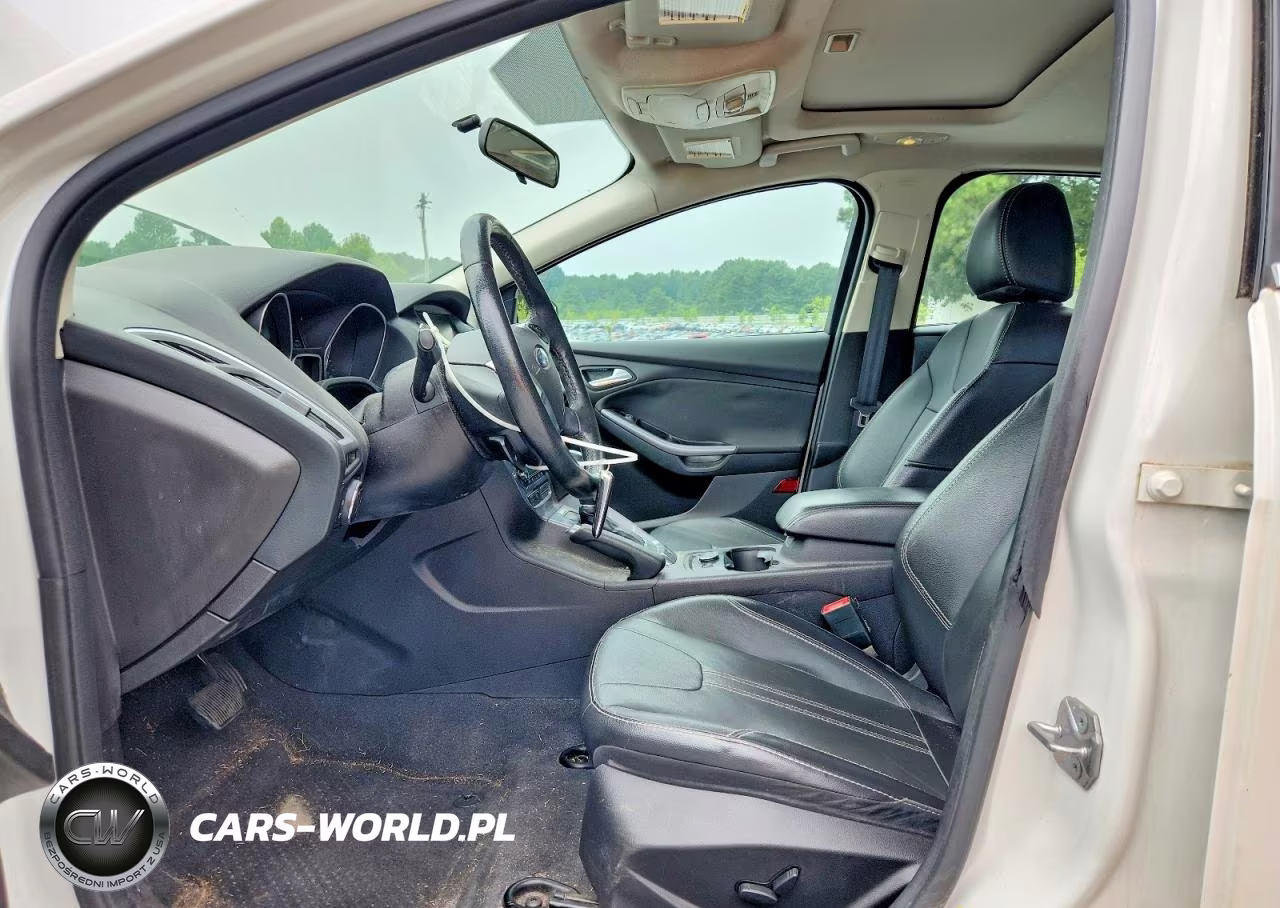 2014 Ford Focus Titanium VIN:1FADP3J25EL297907 - 7