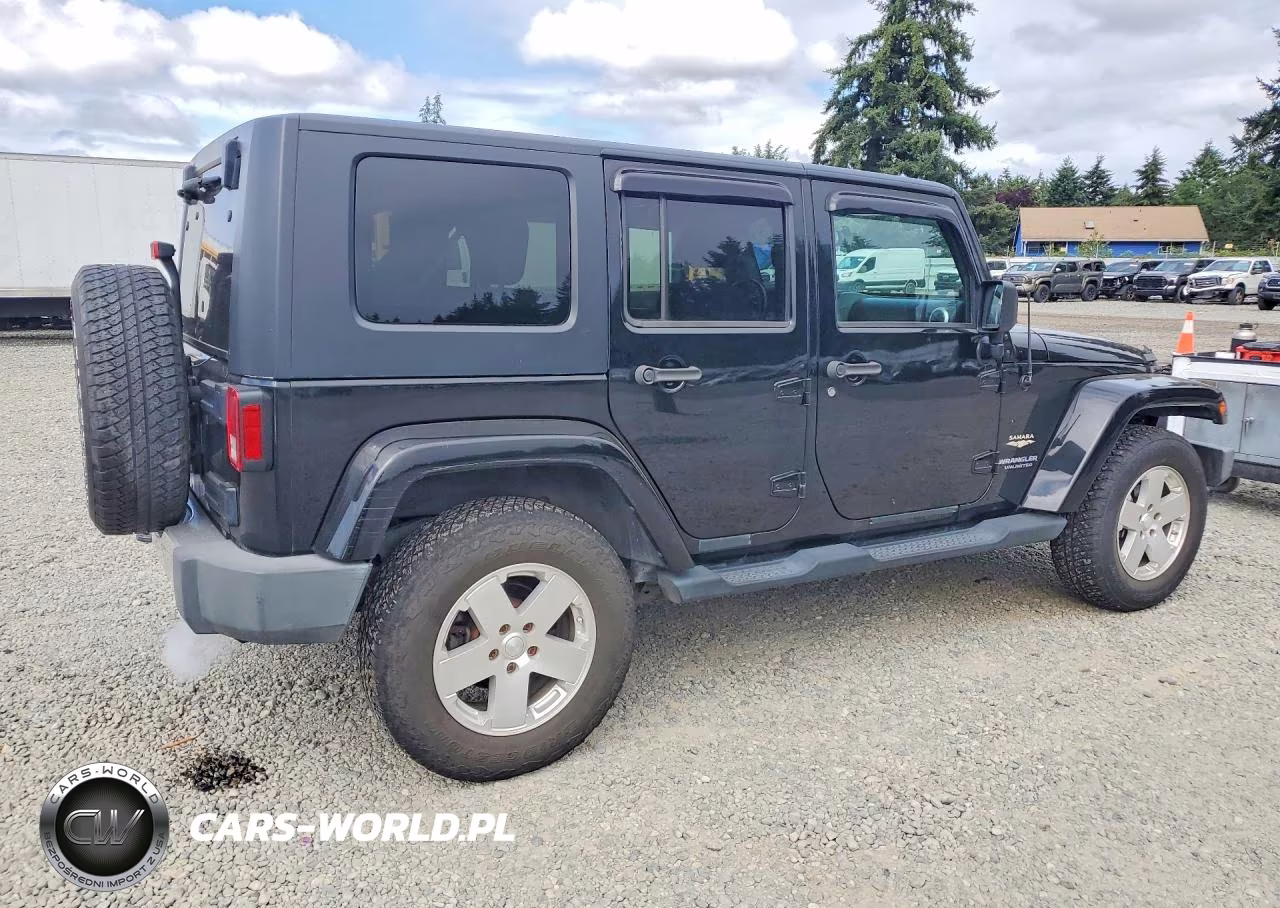 2010 Jeep Wrangler Unlimited Sahara VIN:1J4BA5H16AL115230 - 3