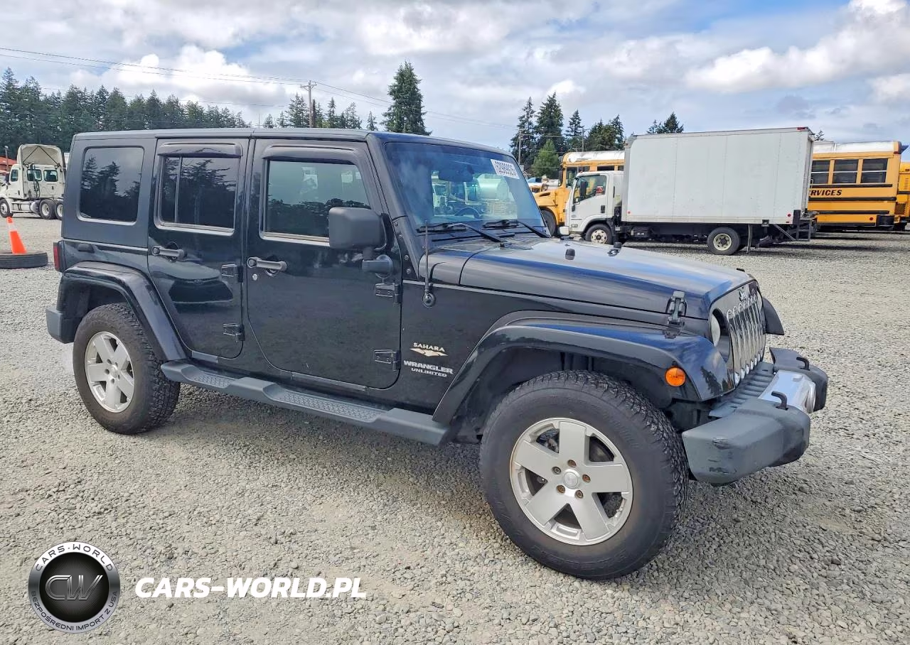 2010 Jeep Wrangler Unlimited Sahara VIN:1J4BA5H16AL115230 - 4