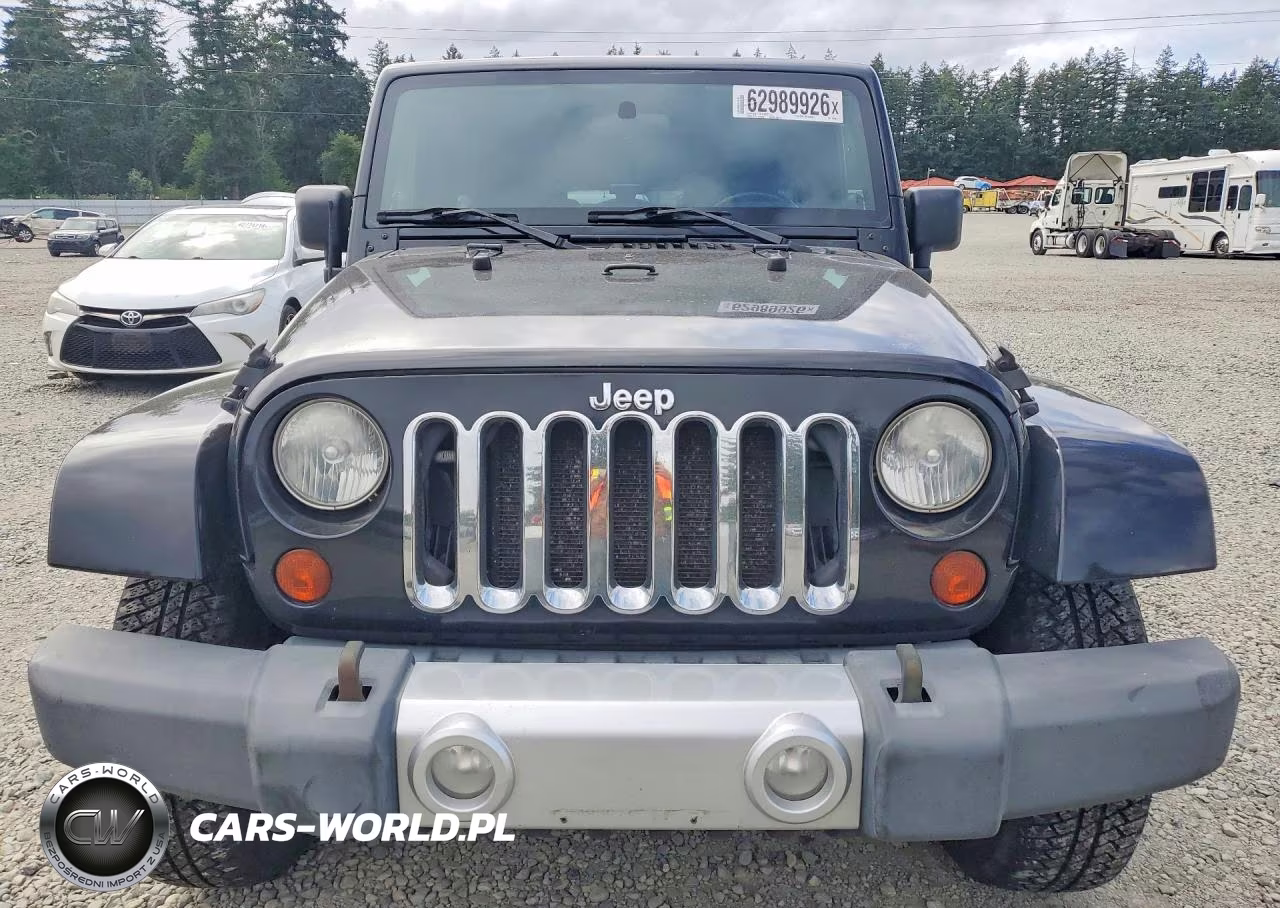 2010 Jeep Wrangler Unlimited Sahara VIN:1J4BA5H16AL115230 - 5