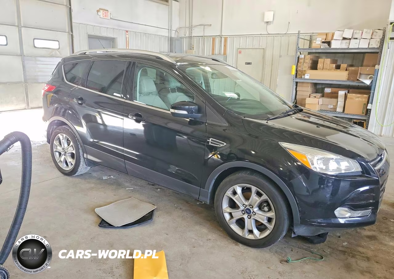 2016 Ford Escape Titanium VIN:1FMCU0JX5GUB20436 - 4