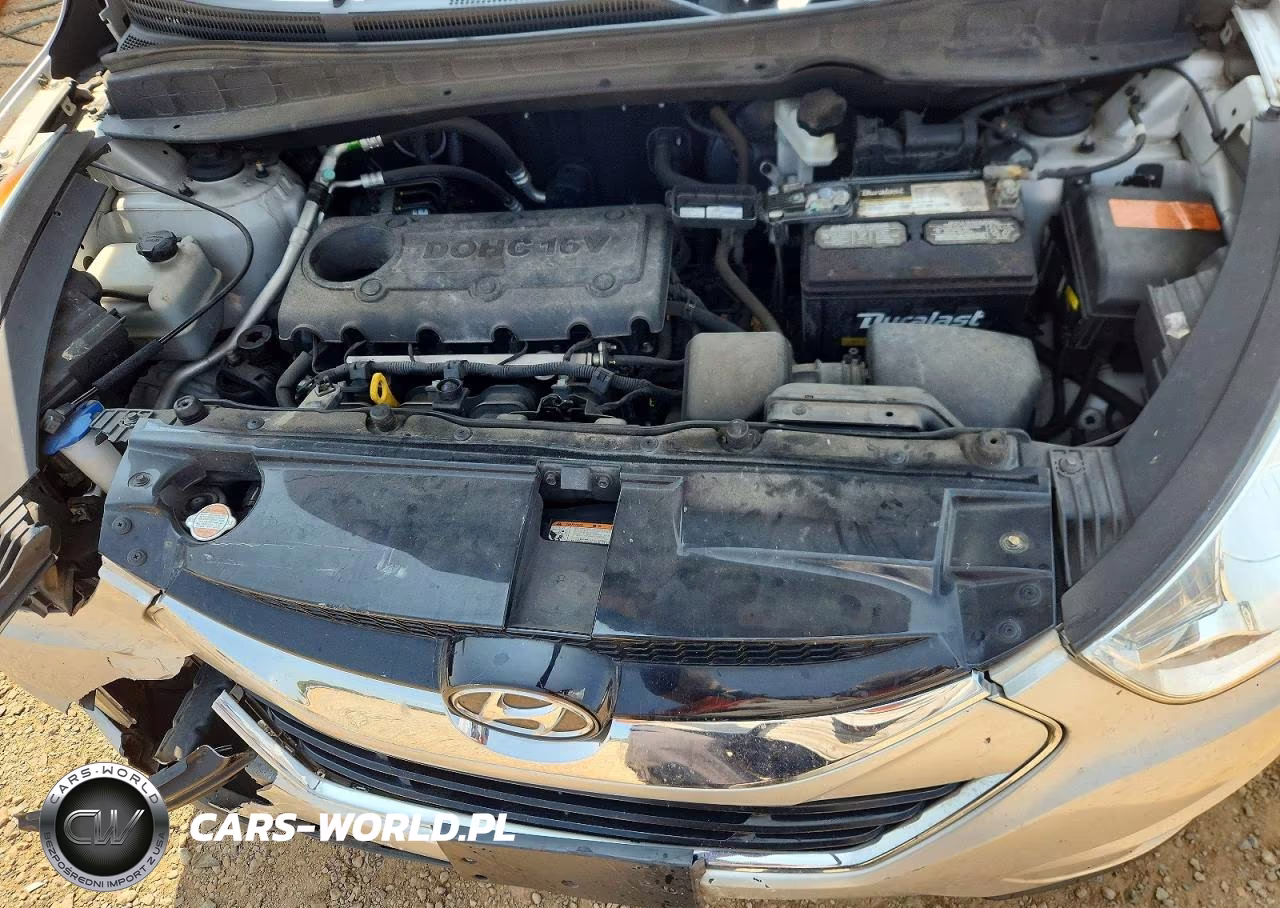 2012 Hyundai Tucson Limited VIN:KM8JU3AC2CU511821 - 12