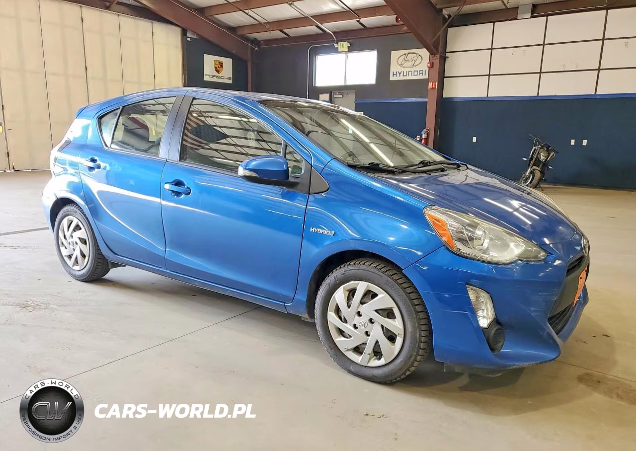 2015 Toyota Prius C One VIN:JTDKDTB34F1579860 - 4