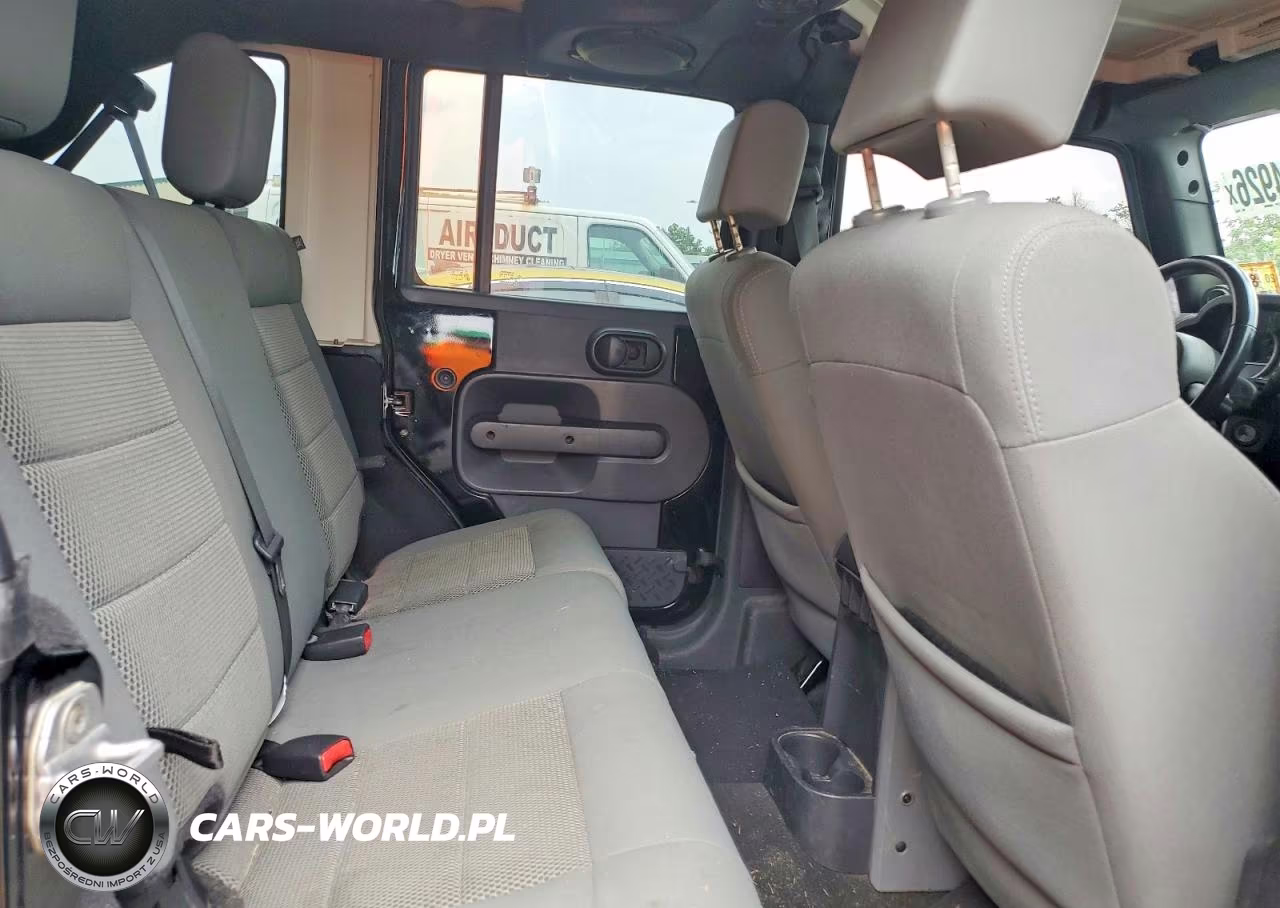 2009 Jeep Wrangler Unlimited Sahara VIN:1J4GA59149L775542 - 10