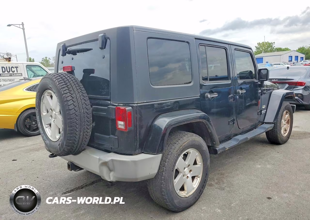 2009 Jeep Wrangler Unlimited Sahara VIN:1J4GA59149L775542 - 3