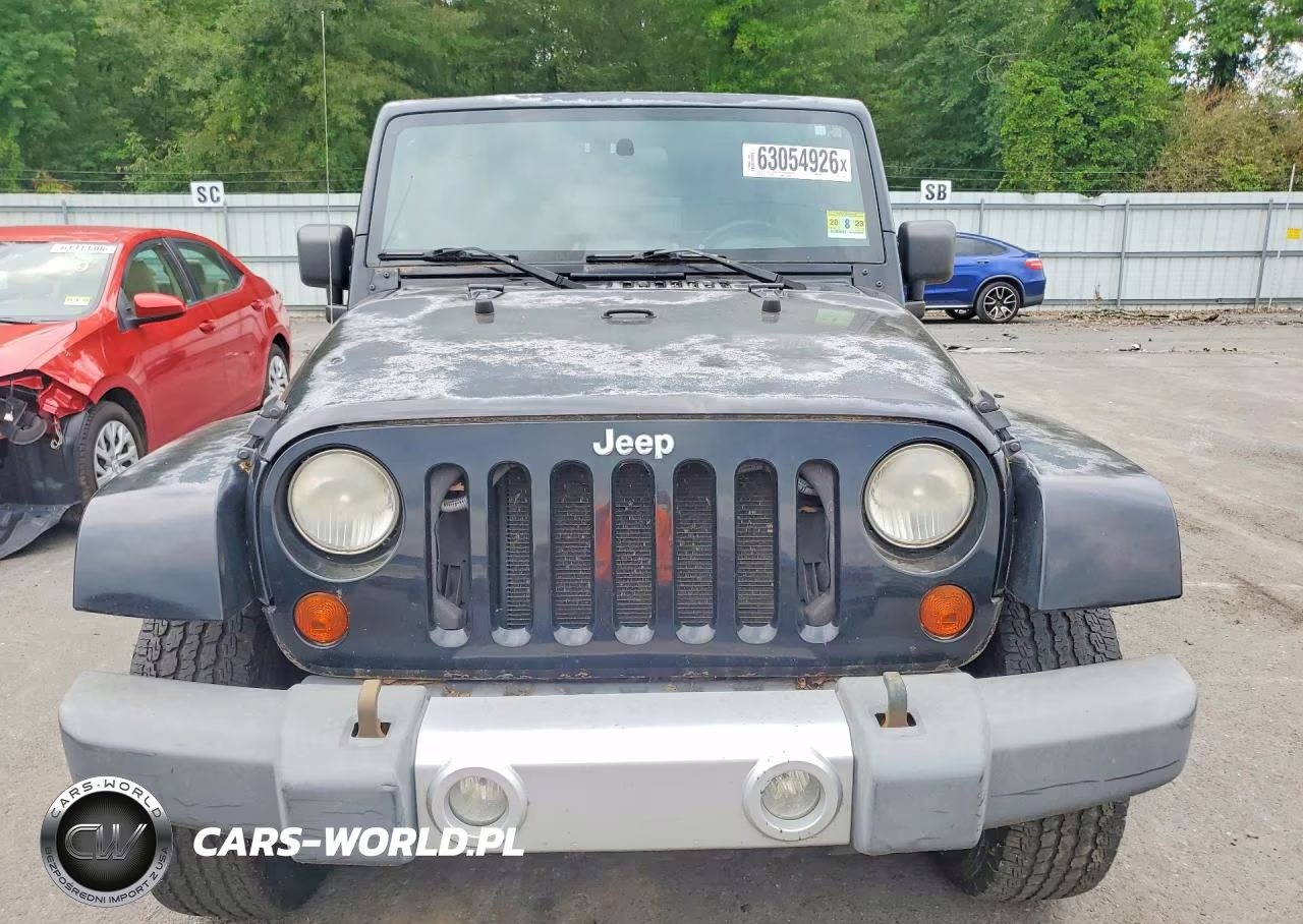 2009 Jeep Wrangler Unlimited Sahara VIN:1J4GA59149L775542 - 5