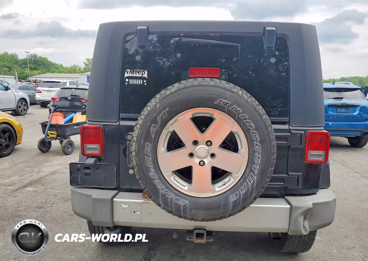 2009 Jeep Wrangler Unlimited Sahara VIN:1J4GA59149L775542 - 6