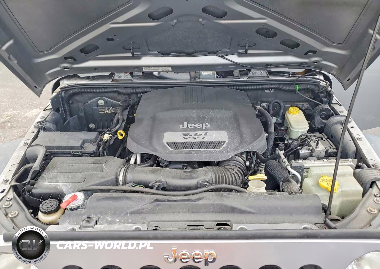 2013 Jeep Wrangler Unlimited Sport VIN:1C4BJWDG2DL705824 - 11