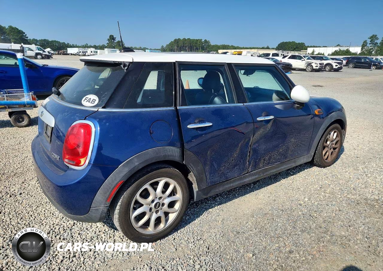 2015 Mini Cooper VIN:WMWXS5C54FT828313 - 3