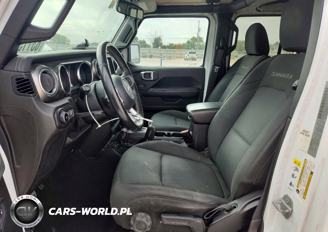 2019 Jeep Wrangler Unlimited Sahara VIN:1C4HJXEN3KW592345 - 7