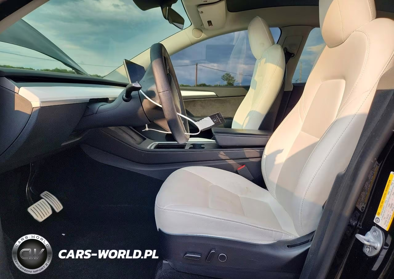 2023 Tesla Model Y VIN:7SAYGDEF0PF636919 - 7