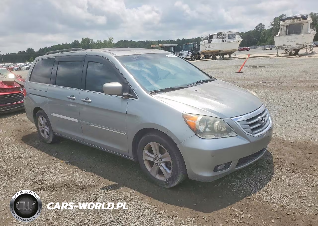 2010 Honda Odyssey Touring VIN:5FNRL3H90AB097027 - 4