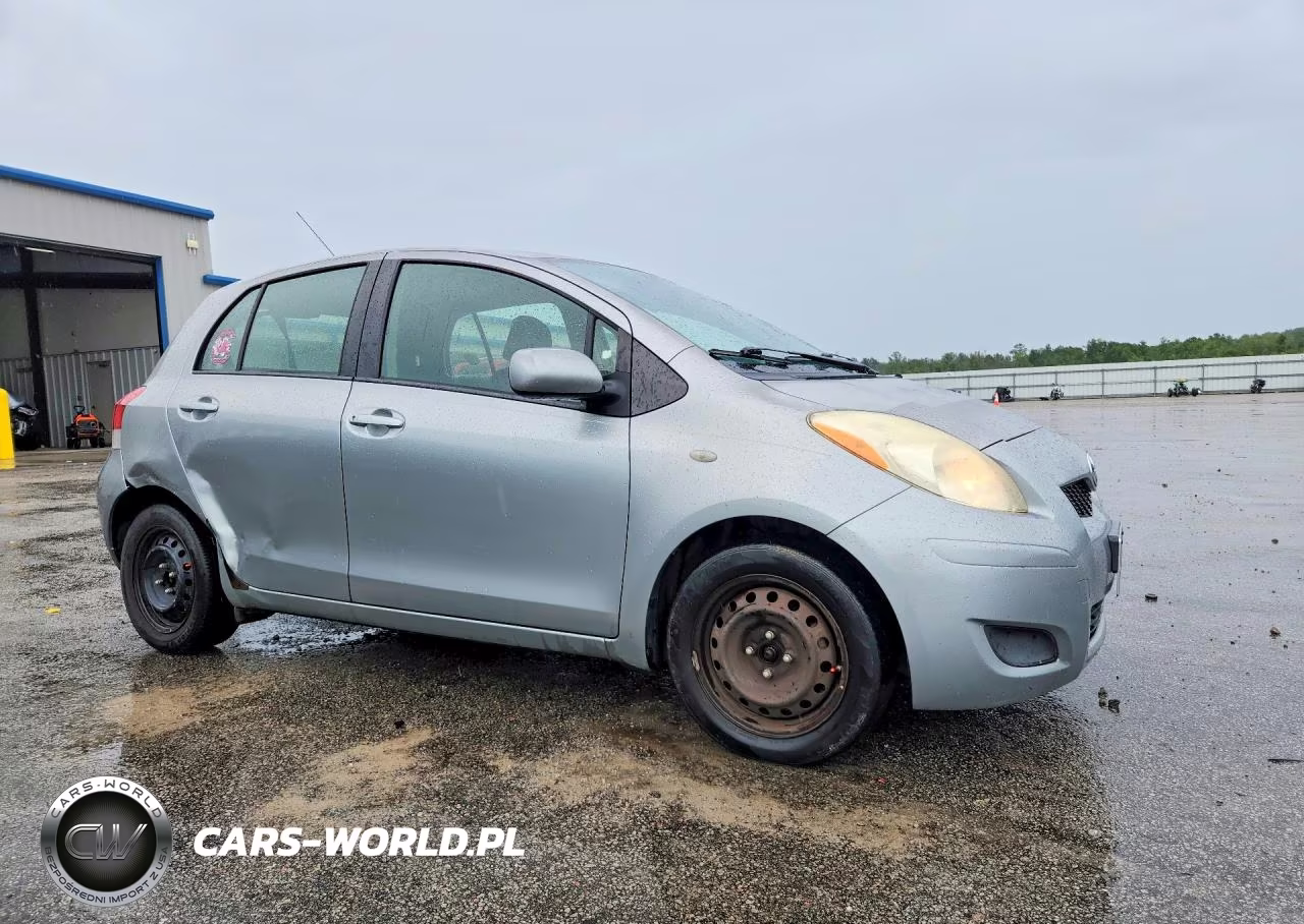 2009 Toyota Yaris Base VIN:JTDKT903895242694 - 4