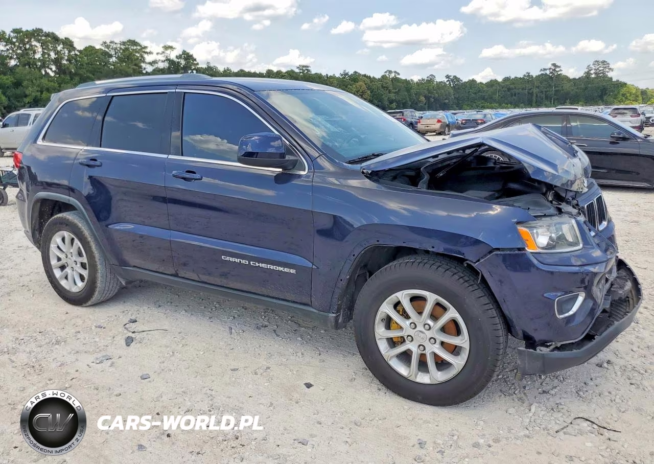 2015 Jeep Grand Cherokee Laredo VIN:1C4RJEAG0FC219657 - 4
