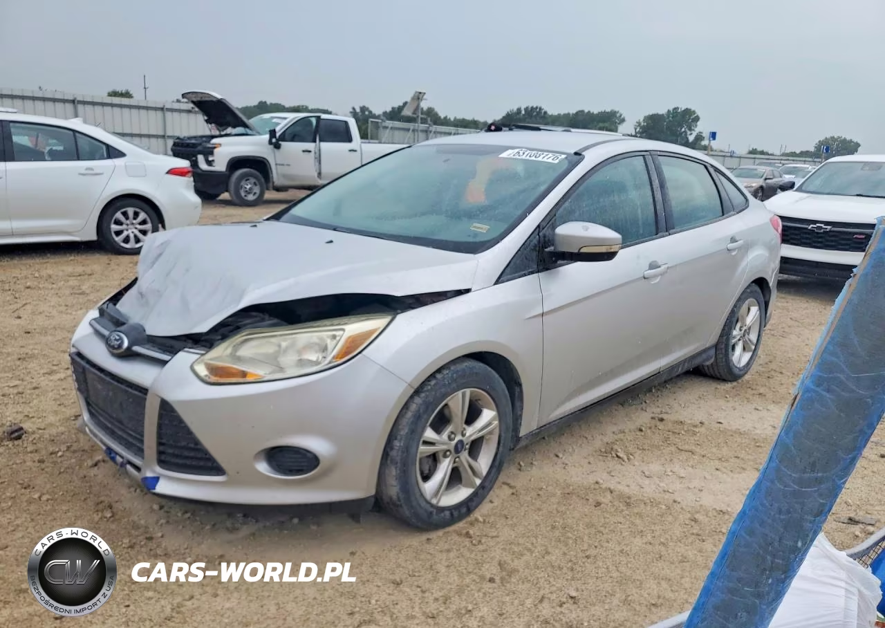 2014 Ford Focus Se VIN:1FADP3F2XEL130869 - 1