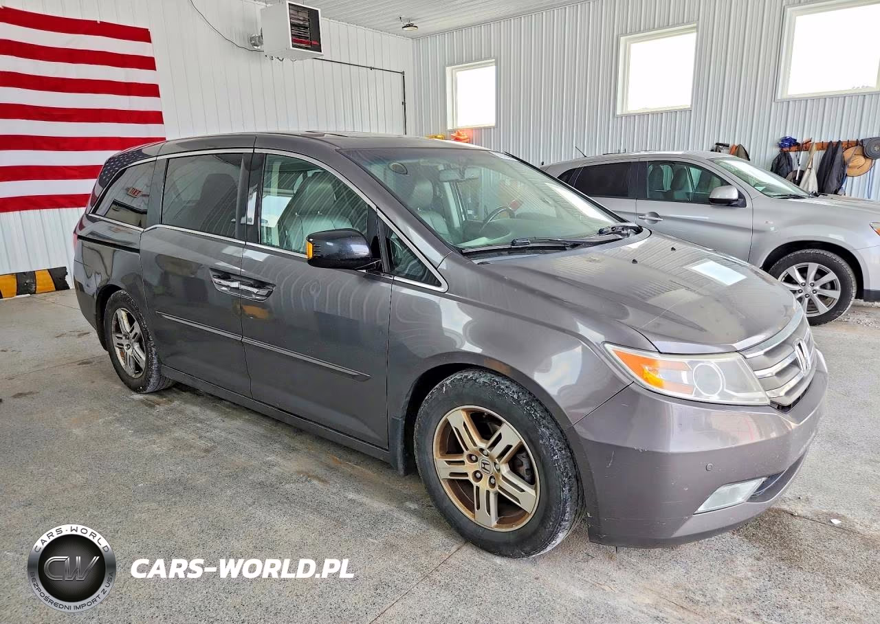 2012 Honda Odyssey Touring VIN:5FNRL5H9XCB107948 - 4