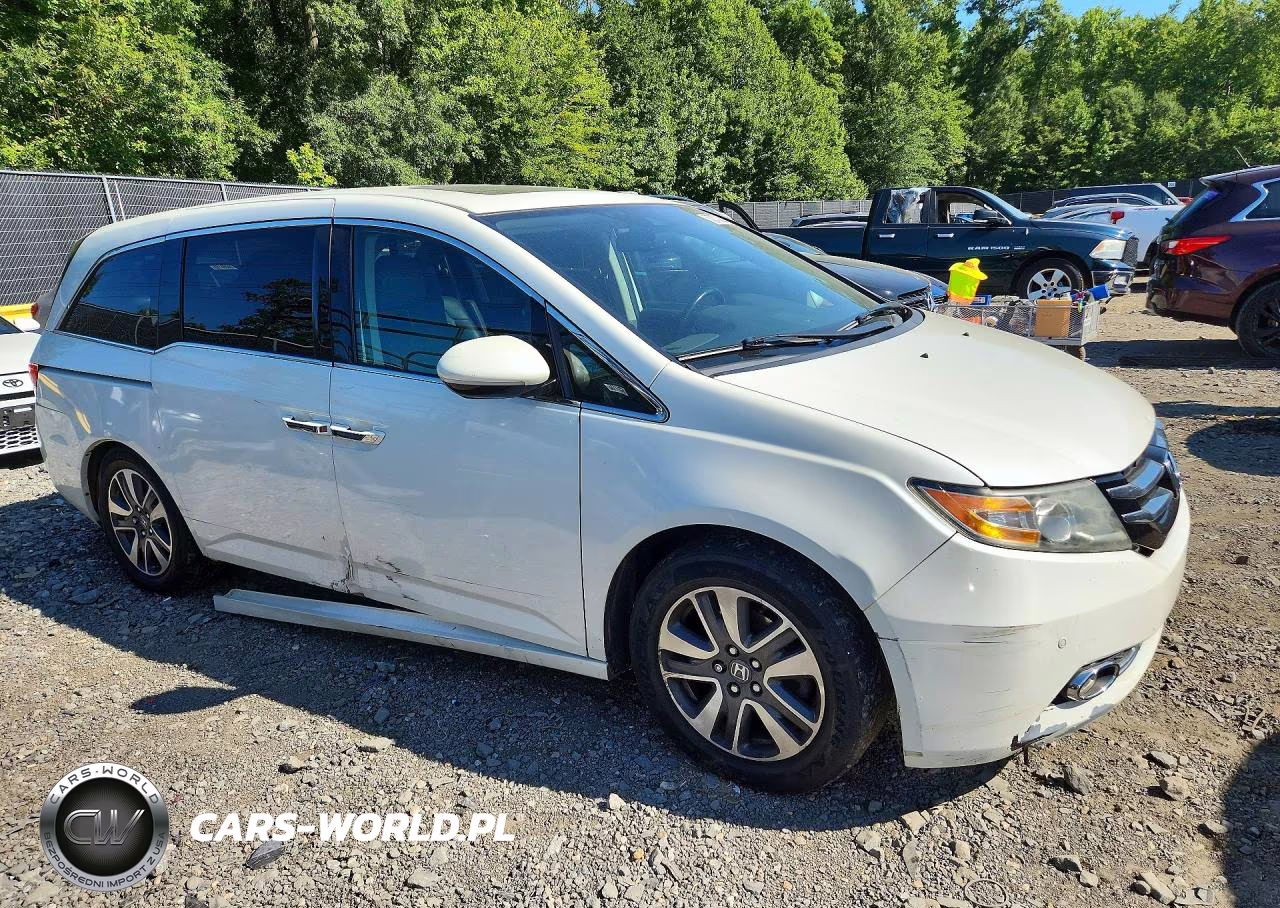 2015 Honda Odyssey Touring VIN:5FNRL5H91FB037244 - 4