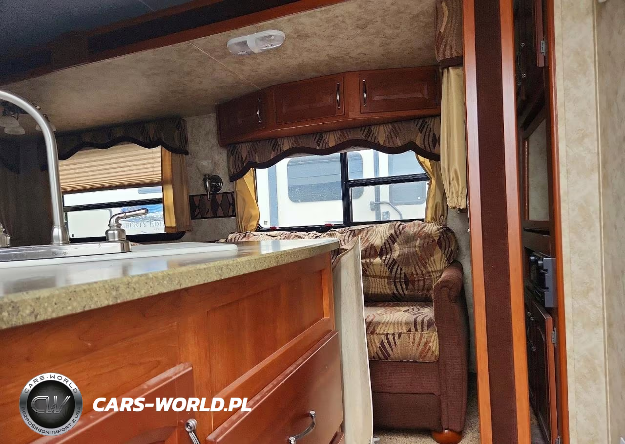 2012 Keystone Cougar Camper VIN:4YDT31S23CV503020 - 5